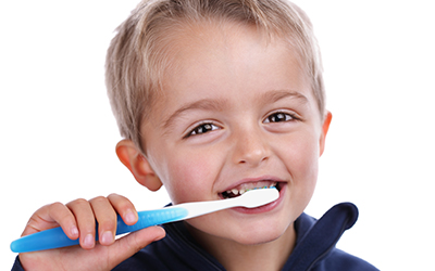 Child brushing teeth