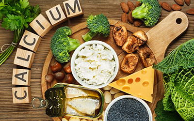 A variety of foods that are rich in calcium such as cheese
