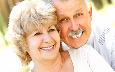 Elderly couple smiling