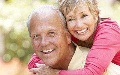 Elderly couple smiling and happy