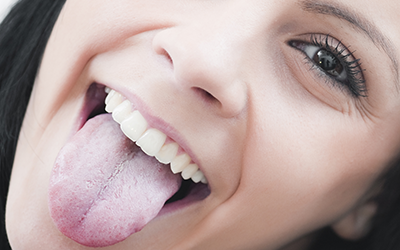 Young girl with tongue sticking out