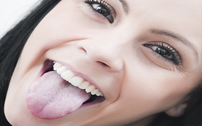 A girl sticking her tongue out